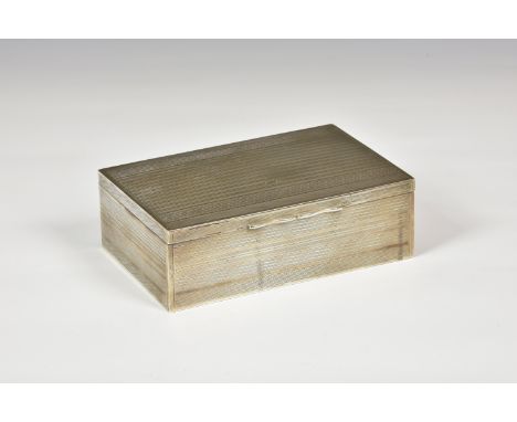 An elegant Polish (Poland) silver engine-turned cigarette box, hallmarked for .800 standard and maker's mark 'CPLA', of recta