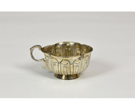A late 18th century Russian silver quatrefoil shaped vodka cup, marks partially indistinct, possibly Moscow 1790, assay maste