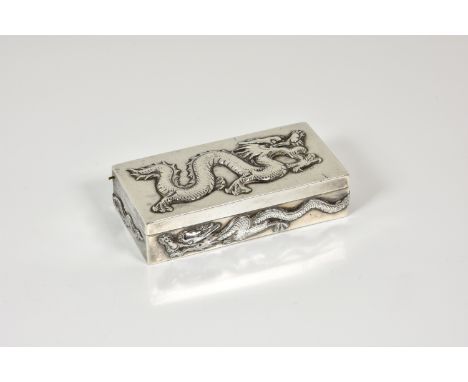 An early 20th century Chinese export silver dragon snuff box, by Wang Hing &amp; Co, Hong Kong, rectangular form, the sides a
