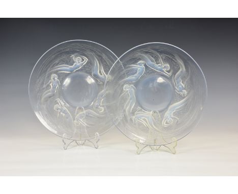 Rene Lalique - a pair of Art Deco period opalescent relief moulded "ONDINES" plates, 11in. diameter, model number 3003, desig