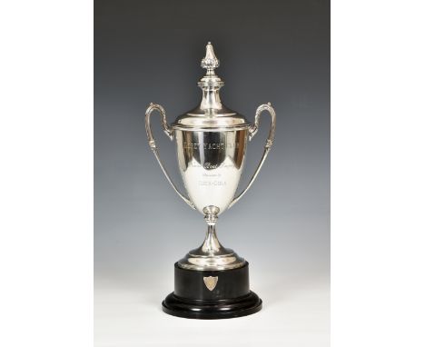 Channel Islands interest - a George V silver trophy cup and cover, Cooper Brothers &amp; Sons Ltd., Sheffield 1918, with leaf