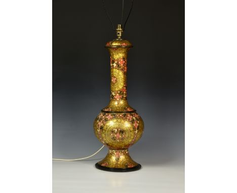 An Indian Kashmiri lacquered table lamp, of vase form, decorated with polychrome flowers and circular and demi-lune gilt rese