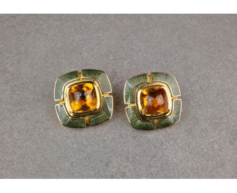 A pair of 18ct gold, citrine and enamel ear clips, by Leo De Vroomen, the mixed cabochon cut citrine held in a bezel setting 
