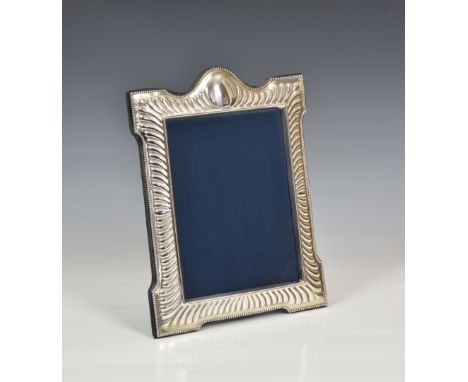 A Victorian style silver easel back photo frame, John Bull Ltd, Sheffield 1990, rectangular form with outset corners, gadroon