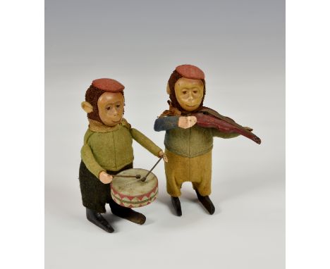 Two Schuco monkey musicians, playing drum and violin, no keys. (2) * Condition: Not tested, no keys, missing bow. Fading to c