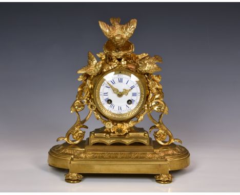 A 19th century ormolu mantel clock in the manner of Jules Moigniez, the twin train movement with outside countwheel strike on