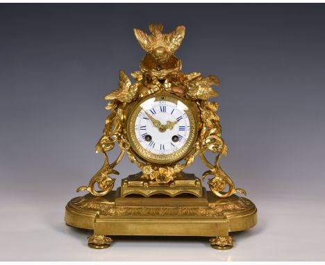 A 19th century ormolu mantel clock in the manner of Jules Moigniez, the twin train movement with outside countwheel strike on