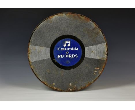 A vintage enamel "Columbia RECORDS" advertising sign, in the form of a 78 shellac record, 18in. (45.8cm.) diameter. * Conditi