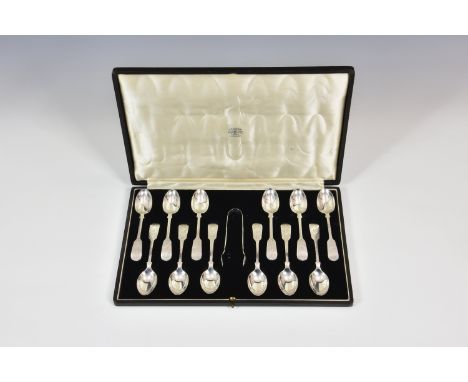 A cased set of twelve bright cut fiddle pattern teaspoons and tongs, William Hutton & Sons Ltd., Sheffield 1907, with engrave