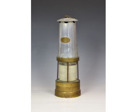 A large miners lamp by 'The Premier Lamp & Eng Co Ltd Leeds', of typical form with hanging hook and brass oval plaque "The Pr