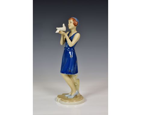 A Royal Dux Art Deco style porcelain figure of a girl with dove, pink triangle patch, printed and impressed marks to base, 11