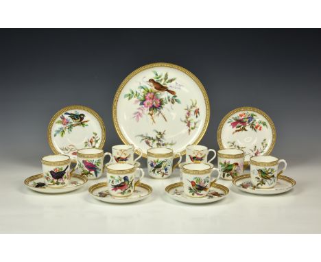 A set of six Royal Worcester ornithological 'jewelled' coffee cups and saucers, impressed factory marks and painted pattern n