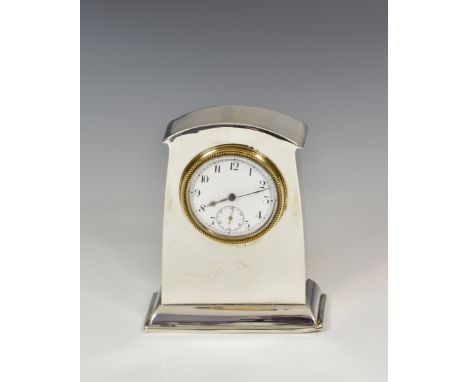 A silver bedside or desk clock by Liberty &amp; Co., Birmingham, date mark rubbed, possibly 1928, of tapering rectangular for