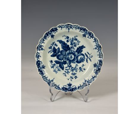 An 18th century Worcester Dr Wall period blue and white shallow bowl, with scalloped edge, floral and cone decoration, cresce