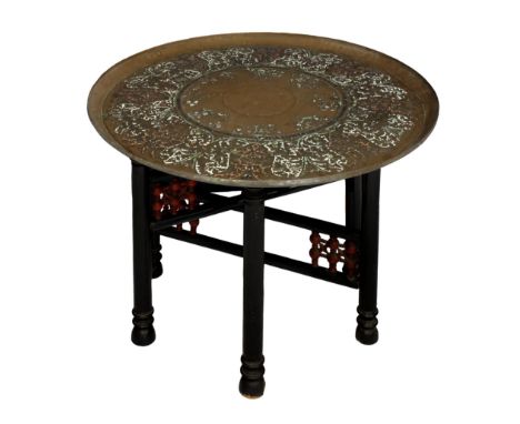 A Persian or Anglo Indian brass and enamel tray top folding table, Victorian, the circular brass Benares style tray top with 