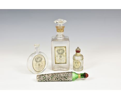 An antique LUCE'S EAU-DE-COLOGNE Jersey perfume bottle with silver sleeve, the green glass conical tapering perfume bottle wi