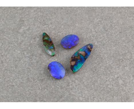 A collection of loose boulder opals, of various shapes. (4) 