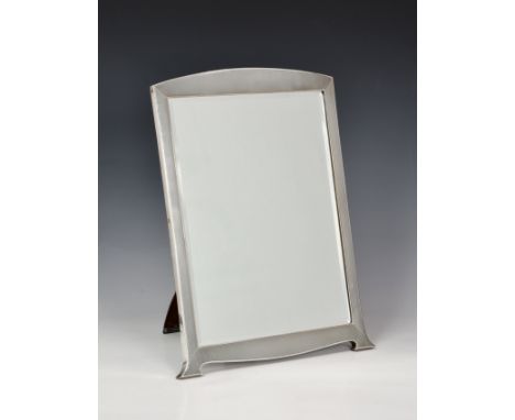 A George VI silver framed easel mirror, Mappin &amp; Webb, Birm. 1939, the rectangular bevelled plate within an engine turned