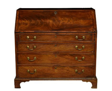 A George III mahogany veneered bureau, the crossbanded fall front with ebony and boxwood stringing enclosing eight shaped pig