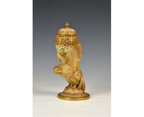 A Royal Worcester eagle pot pourri and cover, shape no. G11, puce printed mark, c.1915, the reticulated ovoid pot pourri supp