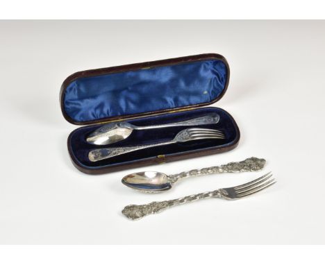 A Victorian cast silver christening fork and spoon, Martin Hall & Co., Sheffield 1853/54, with ornate grape vine decoration, 