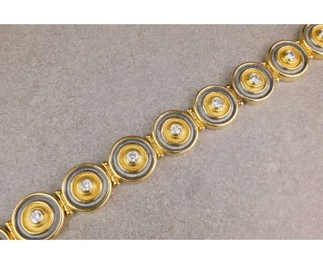 An 18ct gold, diamond and enamel target bracelet, by Leo de Vroomen, the bracelet made of ten links of target form, each targ