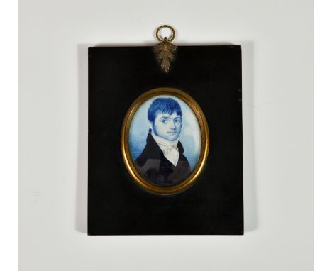 D. Mor (early 19th century), a portrait miniature of a young gentleman, oval, watercolour on ivory in blue and white tones, i