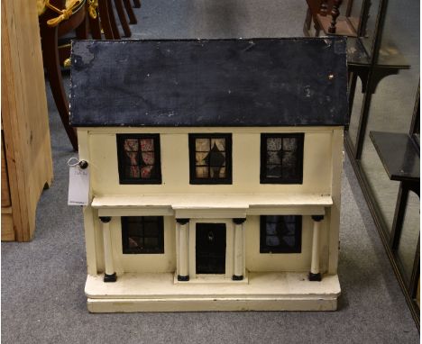 A vintage 20th century two storey Georgian style dolls house with contents, of painted wood construction, opening from the fr