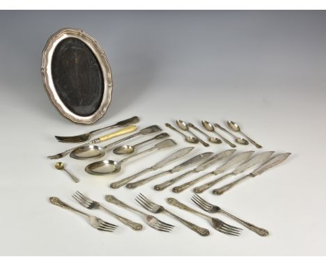 A collection of various silver cutlery and a photo frame, including a fiddle pattern table fork by J. Stone, Edinburgh 1841, 