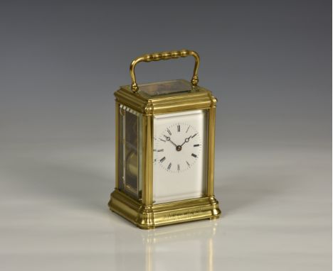 A 19th century carriage clock in a Gorge case, the white enamelled dial with Roman numerals and Breguet style hands within fi