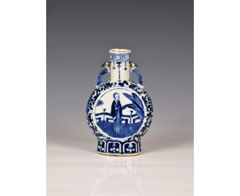 A small Chinese blue and white moon flask, four character Kangxi mark but later, 19th century, with ruyi sceptre handles, pai