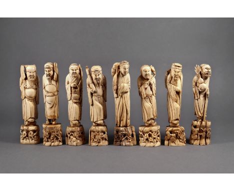 A set of Chinese carved ivory figures of the eight Daoist immortals, probably 18th century, each standing on a base carved an