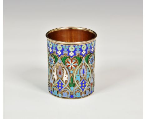 A cased Russian silver gilt and cloisonné/ champlevé enamel beaker, second Kokoshnik Moscow mark (1908-1926)and inscribed ini