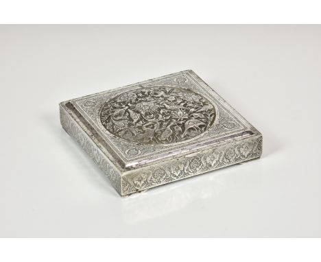 An elegant Persian white metal table box, unmarked, the hinged cover with central circular domed section, repousse decorated 