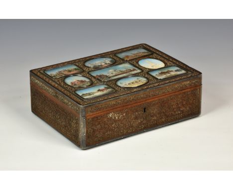 A Northern Indian carved sandalwood and silver box, Delhi, c.1860-70, the box finely carved with scrolling vines and flowers,