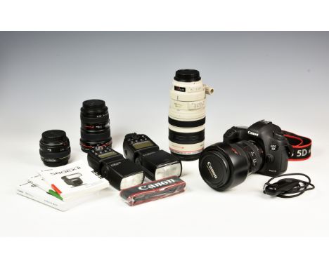 A Canon EOS 5D Mk.III camera outfit, the 22.3mp camera body with EF 24-105mm. 1:4 L IS USM macro lens; EF 100-400mm. 1:4.5-5.