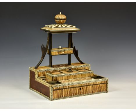 An Anglo-Indian ivory, buffalo horn, sandalwood and porcupine quill inkstand, Vizagapatam, early 19th century, of elaborate t