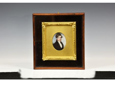 A 19th century portrait miniature of a young gentleman, signed JT (possibly John Turmeau, Liverpool 1777-1846), oval watercol