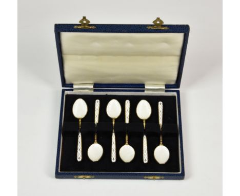 A cased set of Elizabeth II silver gilt and enamel demitasse spoons, Turner & Simpson, Birm. 1971, gross weight 2.05 tr.oz. *