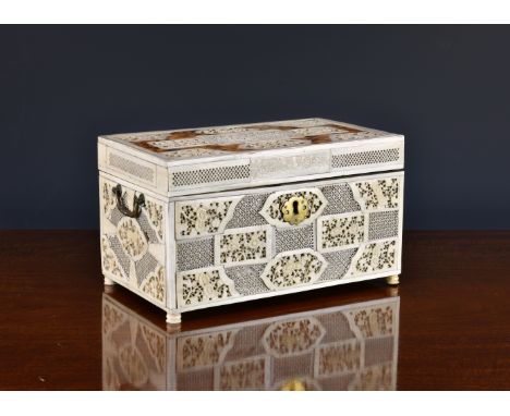 A Chinese export blonde tortoiseshell, bone and ivory tea caddy, 18th century, of rectangular form, the exterior with carved 