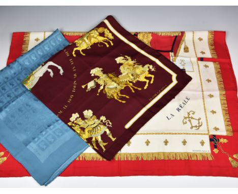 Two silk scarves by Hermes, comprising a "Carousel" scarf designed by Christine Vauxelles, 1984; and a "La Reale (Vue du Caro