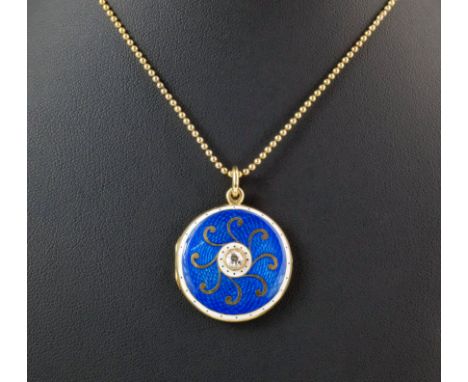 An antique yellow gold, guilloché enamel and diamond locket, the circular locket with vibrant blue, gold and white scroll dec