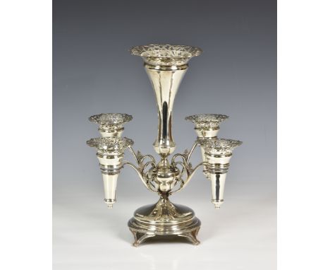 An Edwardian silver epergne, Edward Barnard &amp; Sons Ltd., London 1910, the main trumpet vase with pierced rim and glass li