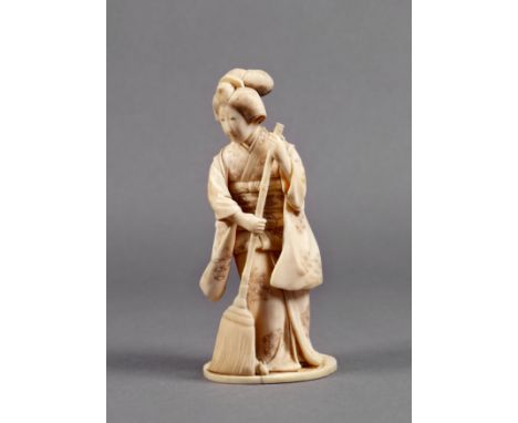 A Japanese carved ivory okimono of a lady in traditional dress, Meiji period (1868-1912), sweeping the floor with a broom, a 