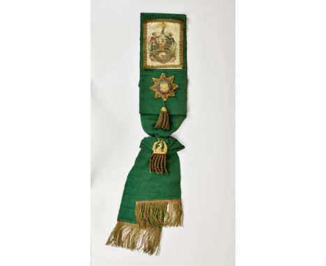 An Ancient Order of Forresters Jersey sash, in green, with applied jewels and crest with gold braiding and tassels. 