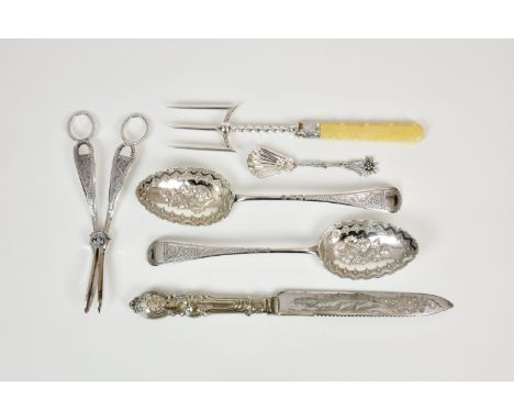 A collection of silver plated cutlery, comprising a toasting fork with organic bone handle; grape scissors; pair of berry spo