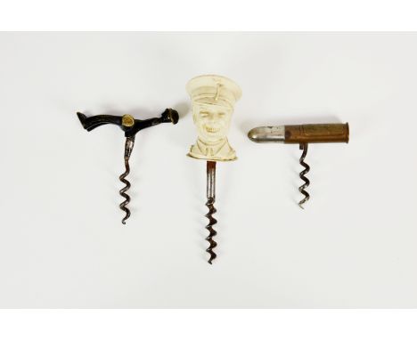 Three military / shooting corkscrews, to include a celluloid bust of Edward VIII; a pocket bullet version stamped 'DRINK ~ LE