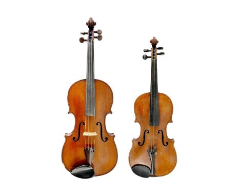 A viola and a violin, circa 1900. Both are of German origin and lack labels. The back of the violin, which is stamped 'Staine