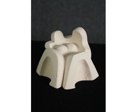 A fired clay figure group, abstract seated couple. H.11cm. 
