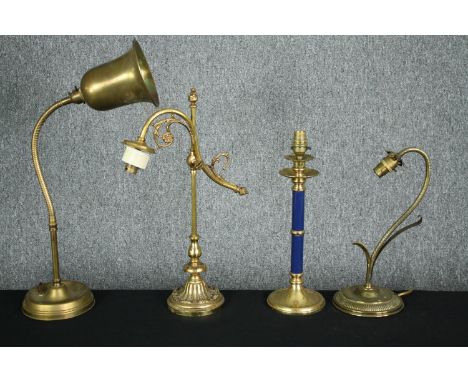 A miscellaneous collection of four brass table lamps to include a desk lamp with articulated flexible reading light. H.46cm. 